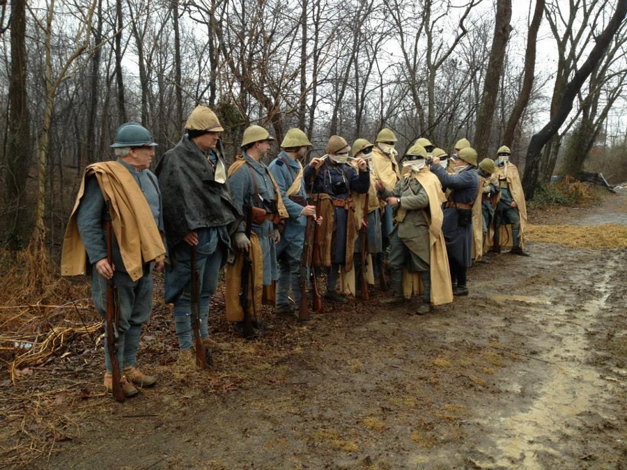 Sgt. Contamine and Lieut. Cartier inspects the gas masks of the men, December 2014