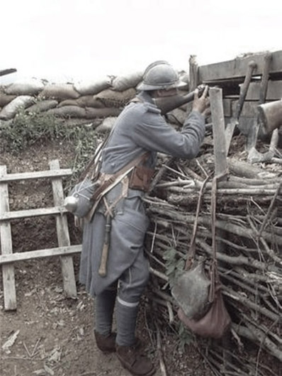 Sdt. Hernandez looks for targets, June 2003.