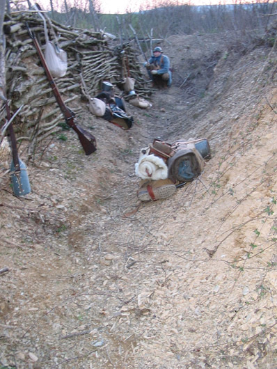 Sdt. Arnoux watching for the enemy at dusk, April 2004.