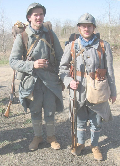 Sdts. Schech and Bracken have a cigarette after morning formation, April 2005.