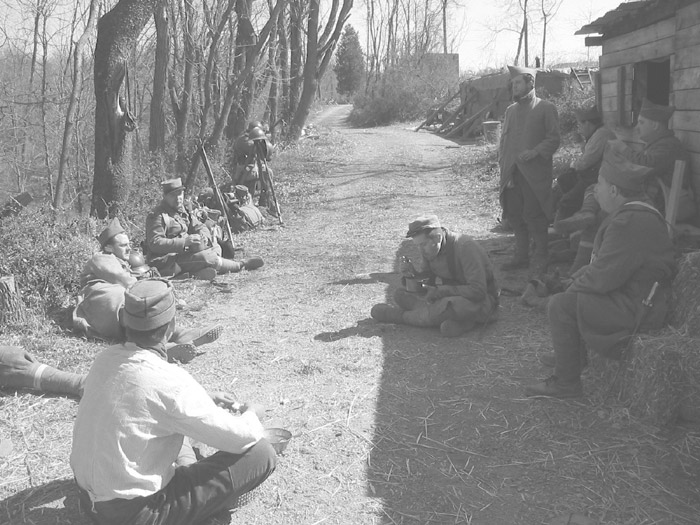 The unit relaxes over the morning mess--beef and vegetable stew, bread and coffee. April 2005