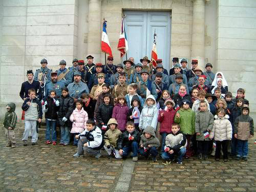 The Poilus de la Marne with the town-children, Remeberance Day ceremony at the town hall of Villeroy, France (Marne), November 11, 2004. 
