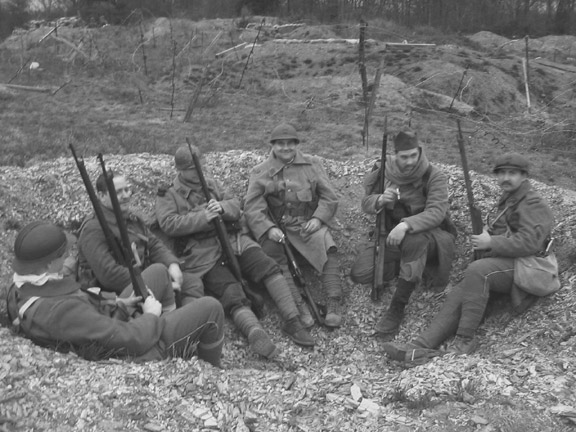 Waiting for orders in a shell-hole, April 2006. From left to right: Sdt. Desjardins, Cpl. Picard, Sdts. Martin, Fagot, Marino, Convard.