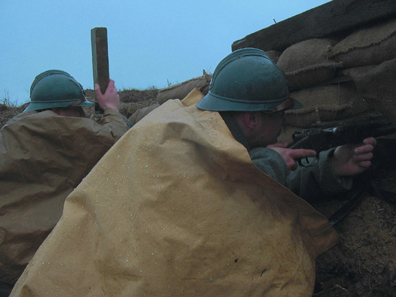 Cpl. Picard and Sdt. Martin searching for targets under the rain, April 2006.