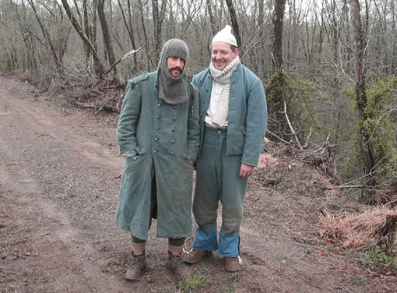 Sgt. Contamine and Cpl. Picard with sore-backs and soggy clothes, April 2006.