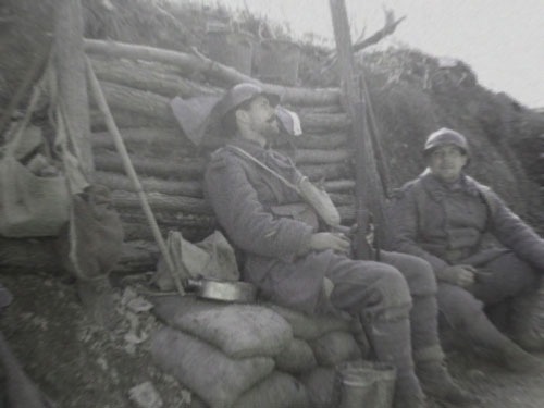 Sgt. Contamine and Cpl. Picard share some wine after 