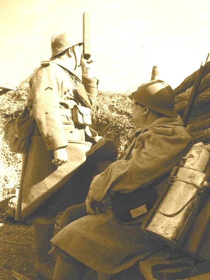 Sdt. Maillard observes the enemy positions as Sdt. Fagot looks on, November 2006