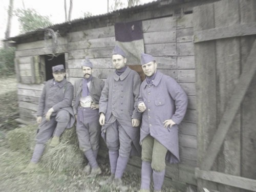 Cpl. Picard, Sgt. Contamine, Sdt. Bouchez and Sdt. Martin pose for a photo in front of the 