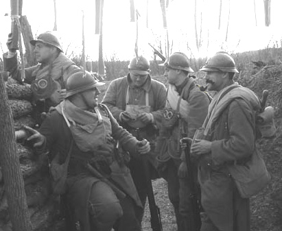 Sdt. Martin observes the objective of a raid in the final minutes before going over the top, November 2007.