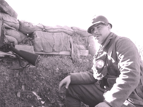 Sdt. Guillaume Martin mans the observation post, November 2007.