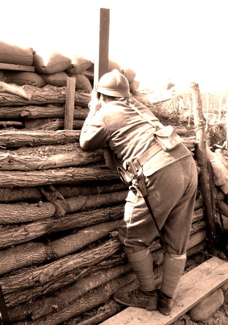 Cpl. Picard peers at the enemy lines through a periscope, April 2008.