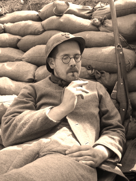 Soldat Schech relaxes with his pipe, April 2008.