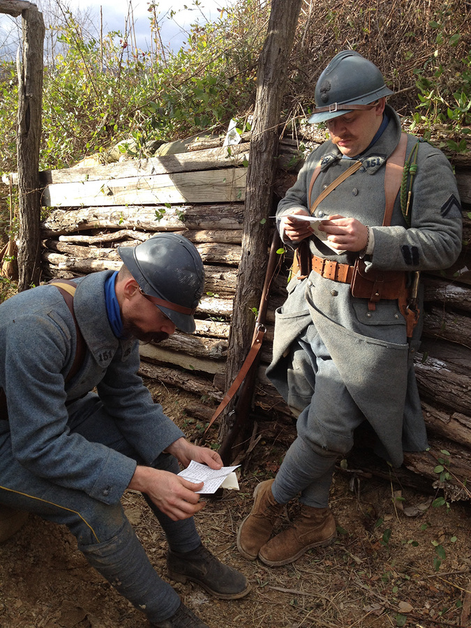 Cpl. Picard and Sdt. Boutroix read letters from home, Nov. 2012.