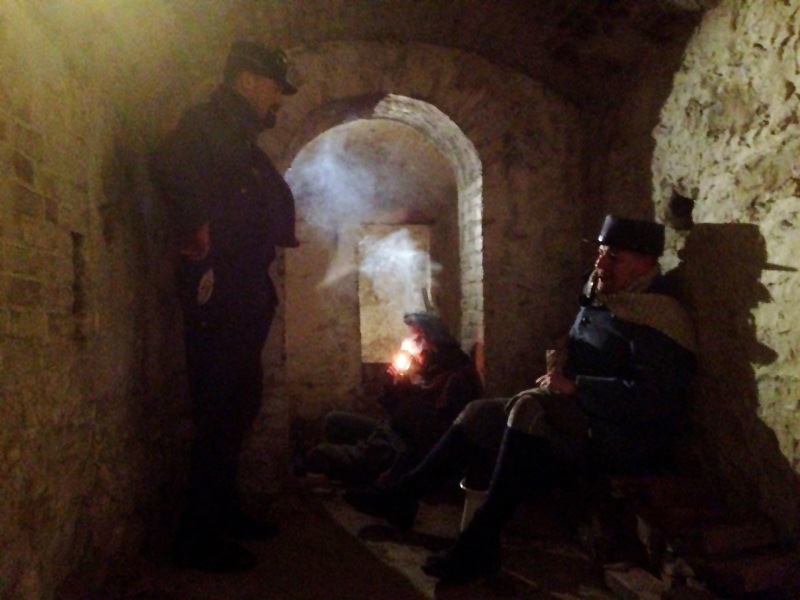 Smoking pipes in the subterranean vaults of Fort Mifflin. This particular room was an old prison cell. Fort Mifflin, March 2013.