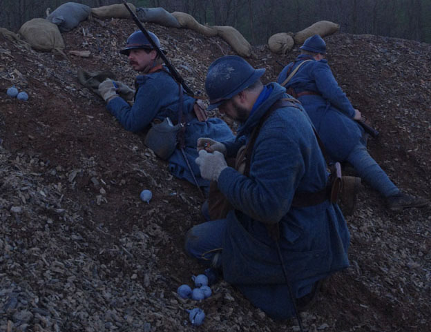 Poilus in position in an advanced post set up in a mine crater, prepping grenades. Newville, April 2013.