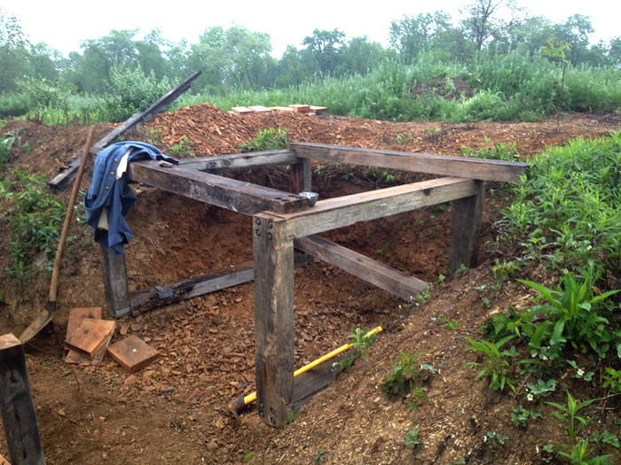 Constructing a shelter in the second line trench at the French company work weekend. Newville, September 2013.