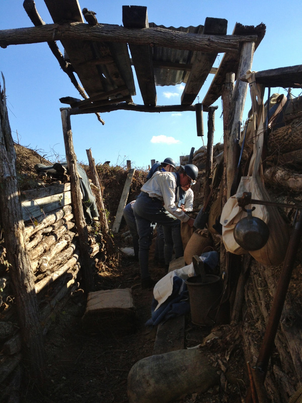 Members of the 151 repairing a trench wall. Newville, November 2013.