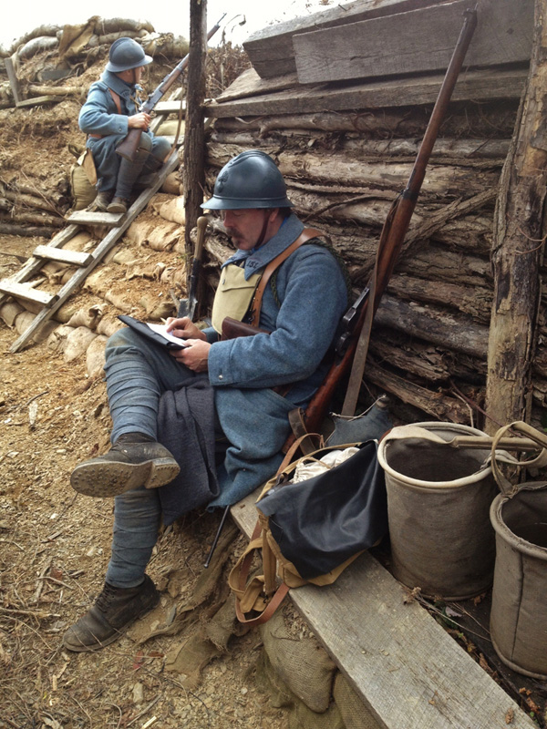 Sdt. Rouland takes advantage of a quiet moment to write a letter. Newville, November 2013.