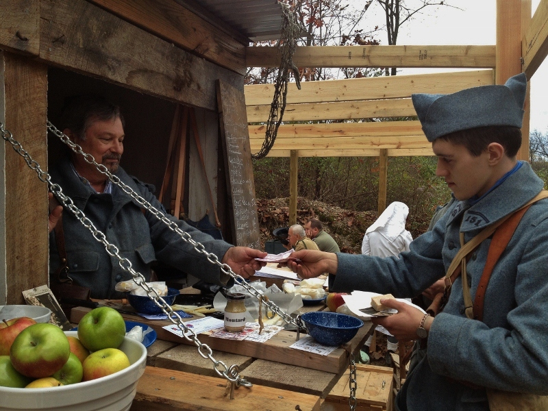 Sdt. Auriac hands over his well-earned sous for some goodies at the co-op. Newville, November 2013.