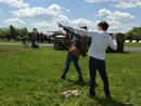 Sdt. Nicolas demonstrates the proper grenade throwing technique to a member of the public.