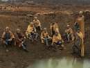 Members of the 18e RI and 151e RI in a shell-hole, December 1914.