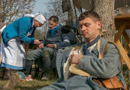 Sdt. Bouchez waits to receive care at the Canadian field hospital while Sdt. Arnouil is treated by a nurse, November 2014