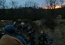 A patrol party gets in position to depart the lines, November 2014