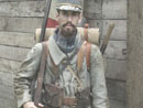 Sgt. Contamine poses in front of the unit's bunker, June 2004.