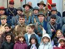 The Poilus de la Marne with the town-children, Remeberance Day ceremony at the town hall of Villeroy, France (Marne), November 11, 2004. 
