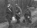 Cpl. Picard leads a water chore with Sdts. Desjardins and Martin, April 2006.