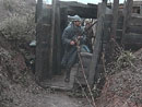 Sgt. Contamine holding down a conquered German trench in an attack under a driving rain, April 2006.