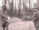 Sgt. Contamine discusses with American trainees the procedure for clearing an enemy trench using hand grenades, April 2010.