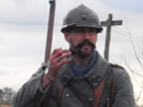 Sgt. Contamine passing the time before battalion formation, Nov. 2010.