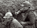 Poilus demonstrate to American trainees how to progress through a trench using hand grenades, April 2010 