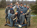 The French soccer team holds aloft their trophy: a bottle of champagne. Nov. 2012.