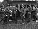 A group of soldats spend their francs judiciously at the French company co-op shop, Nov. 2012.