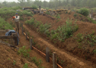 Progress is made on the second line trench during the French company work weekend. Newville, September 2013.