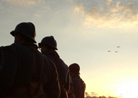 A formation of planes flies over a dawn formation of the Allied battalion. Newville, November 2013.
