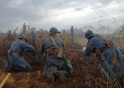 Repairing wire under the cover of a smoke screen. Newville, November 2013.