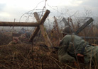 French company takes cover during a feint attack. Newville, November 2013.