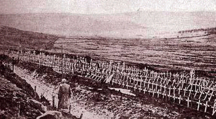 Wooden crosses adorn fresh graves near Verdun.