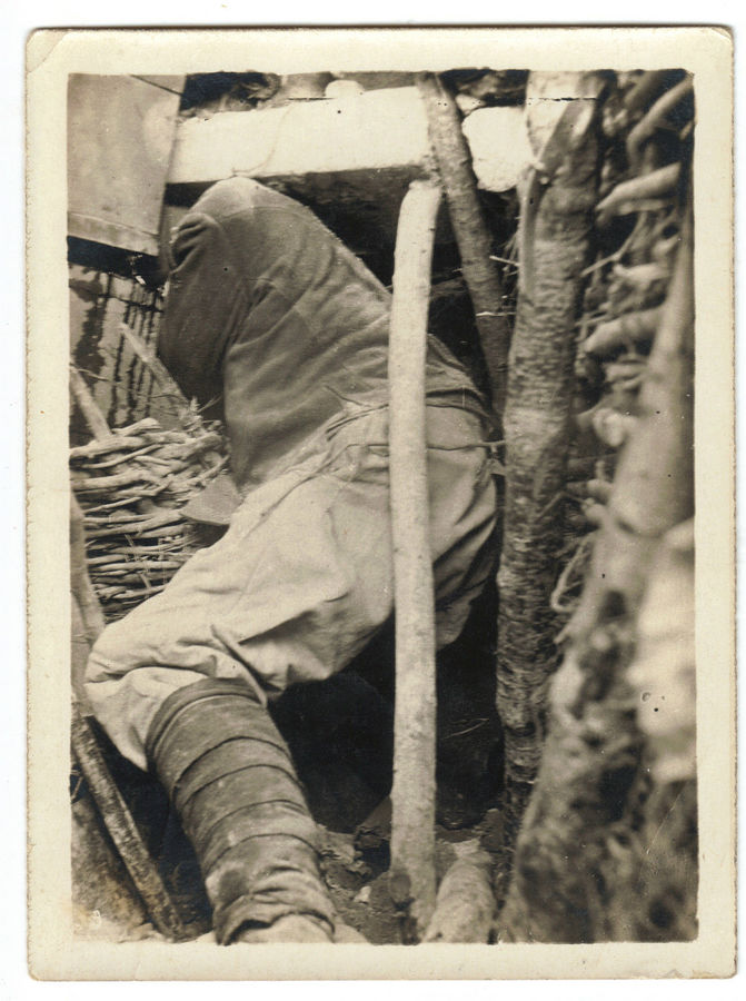 The body of an artillerist whose head was crushed in a shelter at Vauquois.