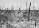 Almost lost in the devastation, a group of French stretcher-bearers bearing a wounded man across Hill 304 on the Left Bank of the Meuse, Verdun. 