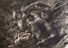 The body of a French soldier lies beside that of a German, at Combles (Somme) in October 1916.