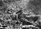 The half-buried, decaying bodies of French soldiers at Verdun.