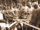 French soldiers inspect the crash of a German plane at Verdun, 1916.